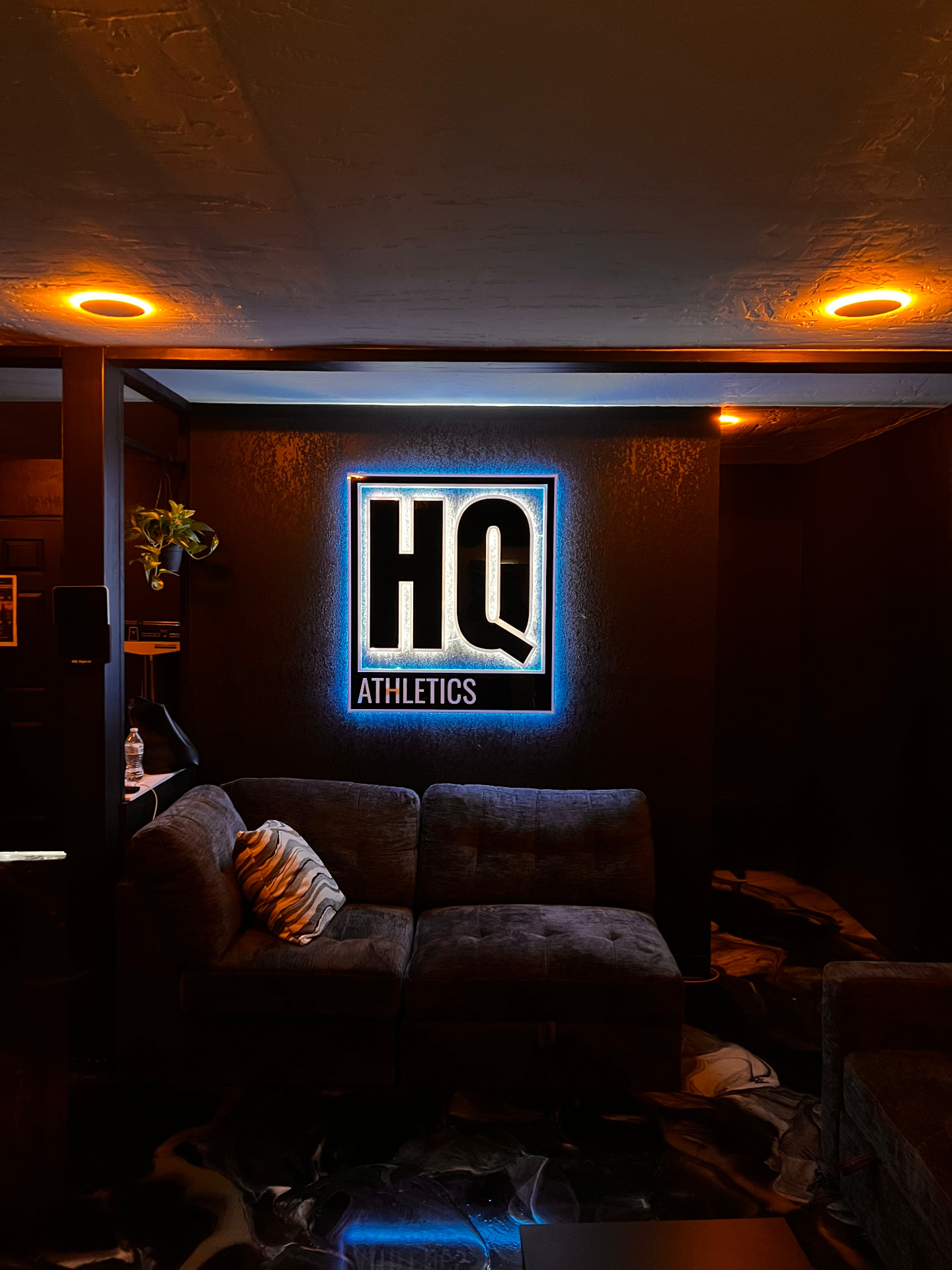 Athletics HQ dimensional logo with a cool backlit glow